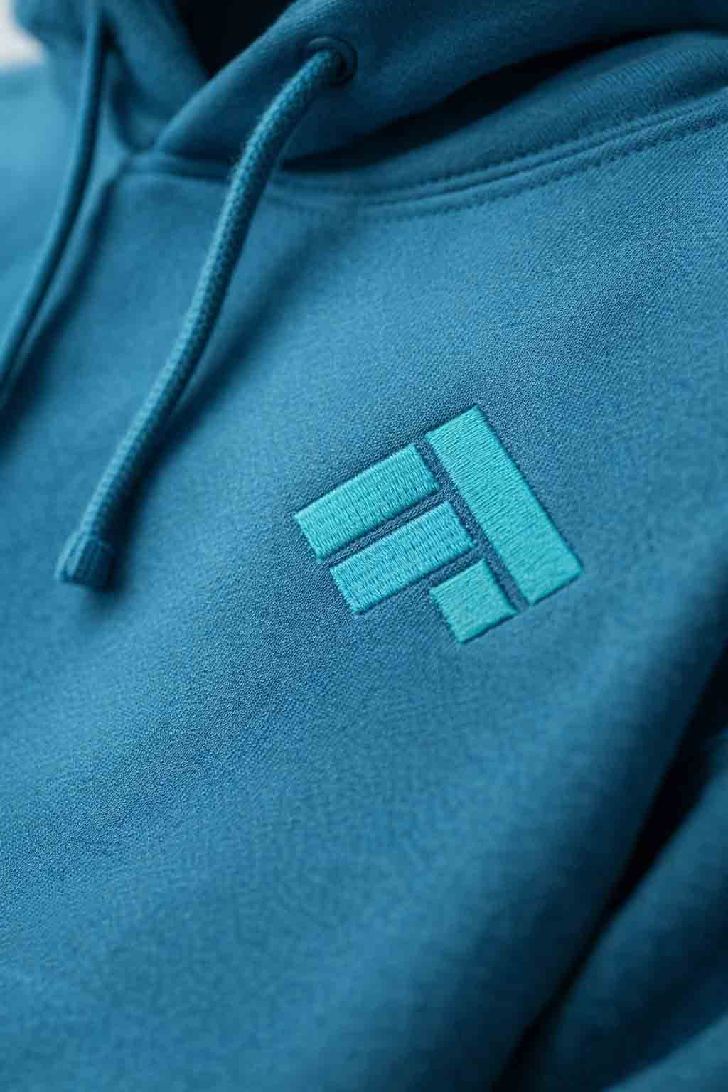 Close-up of premium embroidered logo on a hoodie